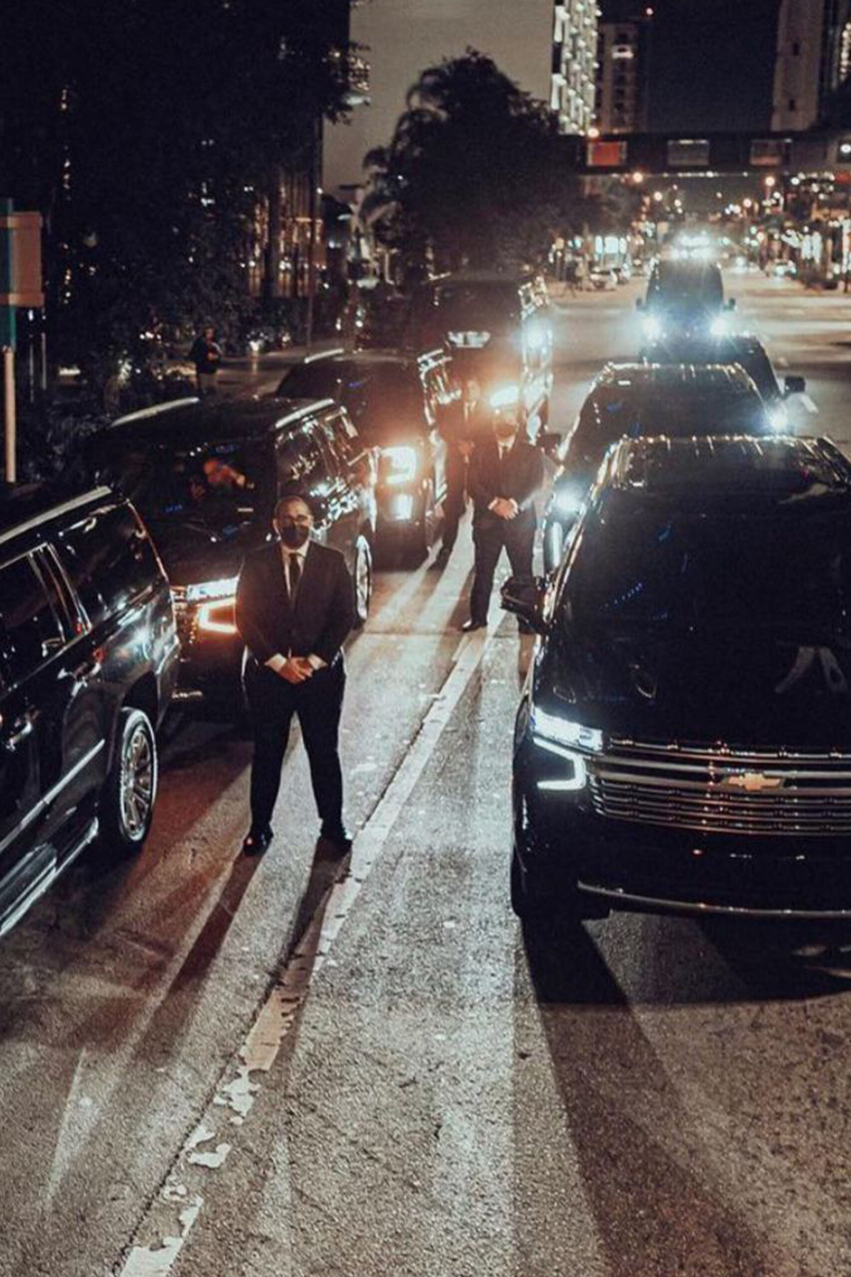 Businessman giving a thumbs up while at work