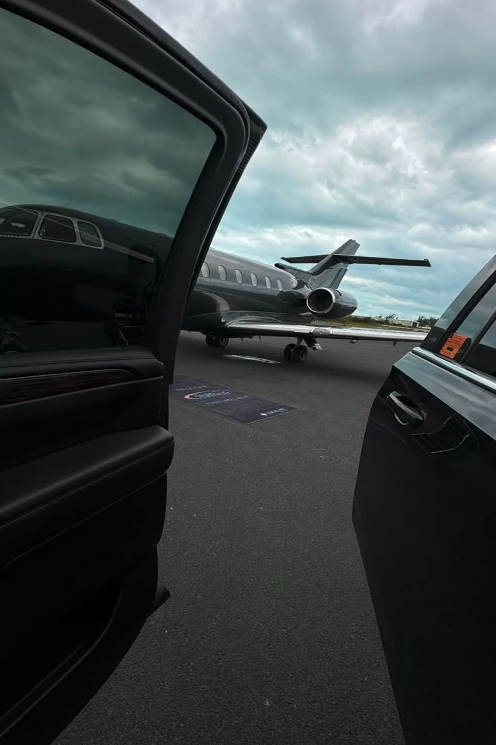 Businessman giving a thumbs up while at work